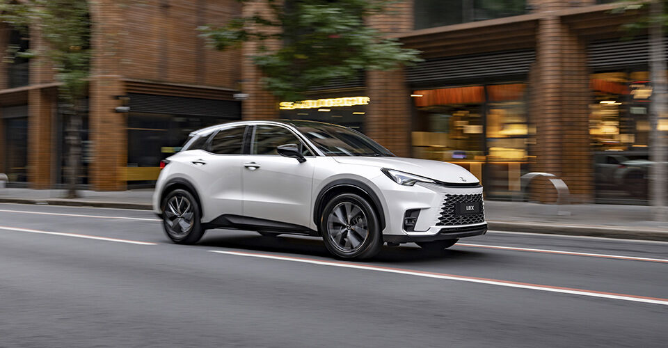 2026 Lexus SUV driving through the city