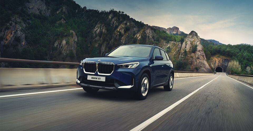 2026 BMW X1 SUV in blue on road