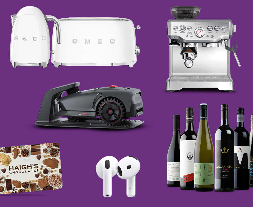 Collage of entertainment prizes including coffee machine robo lawnmower wine and gift cards on a purple background