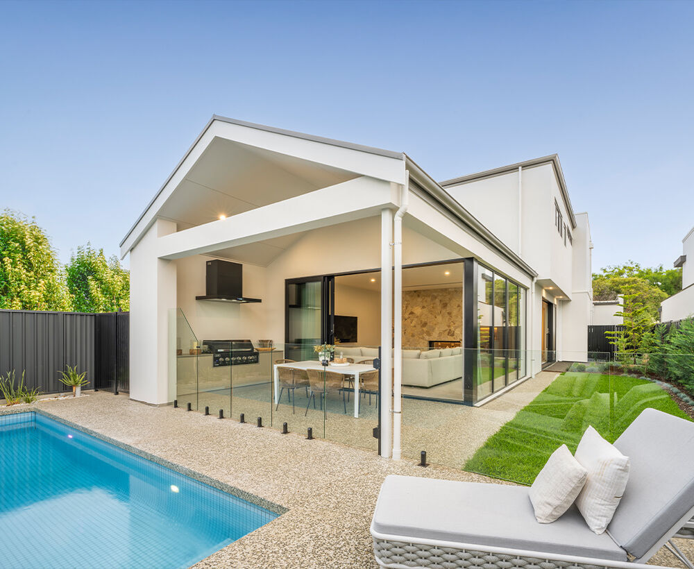 Grand prize home July 2025 backyard featuring pool and alfresco area