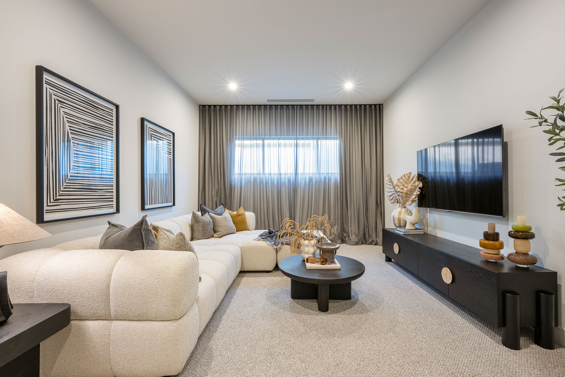 Upstairs second lounge room with tv