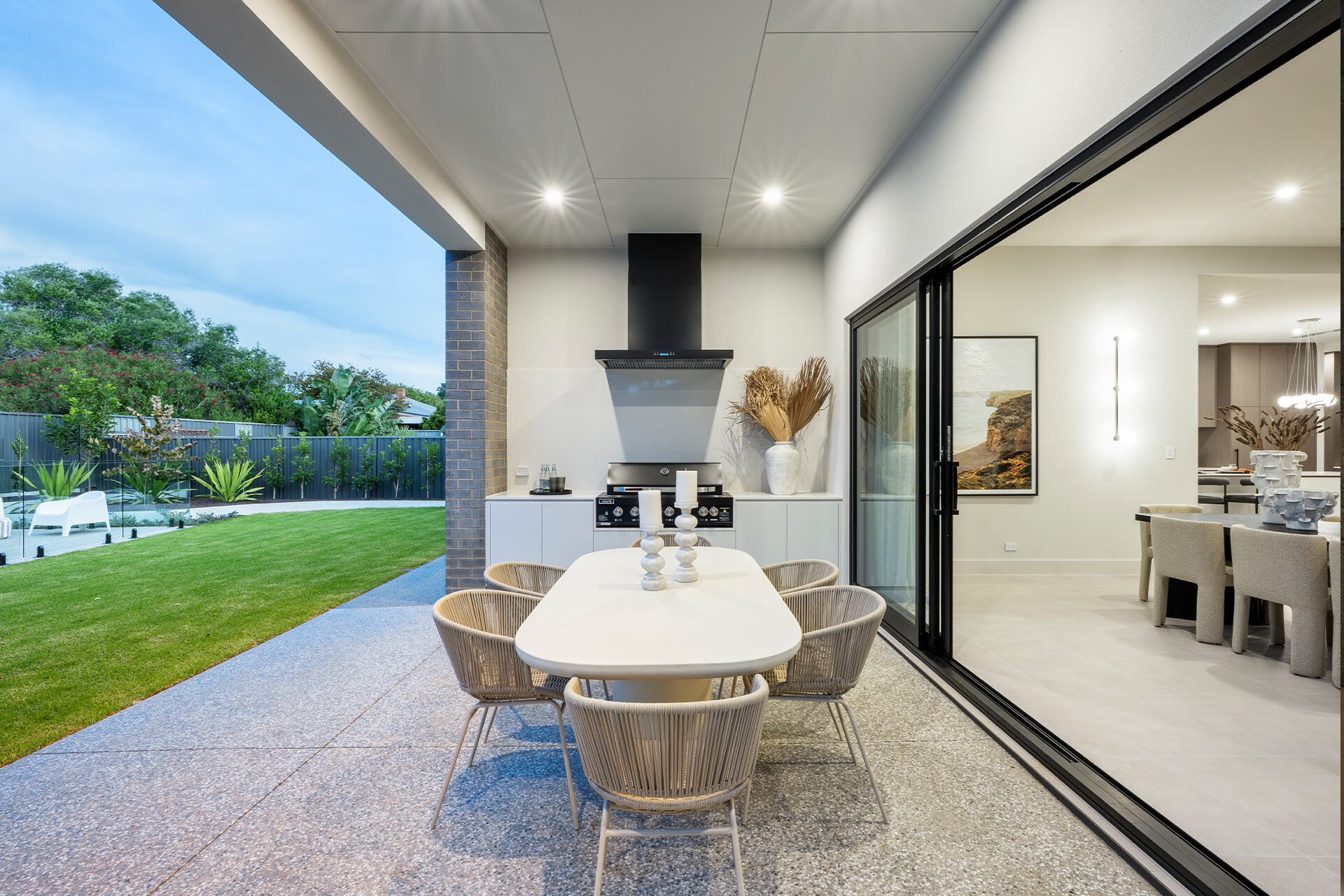 Outdoor alfresco area dining table and under cover bbq